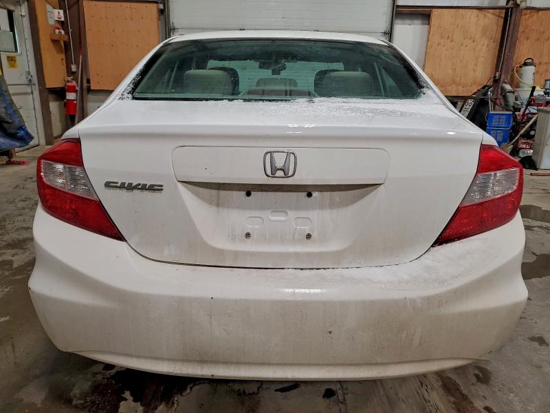Photo 6 from auction – 2012 HONDA CIVIC LX with VIN 2HGFB2F45CH114152