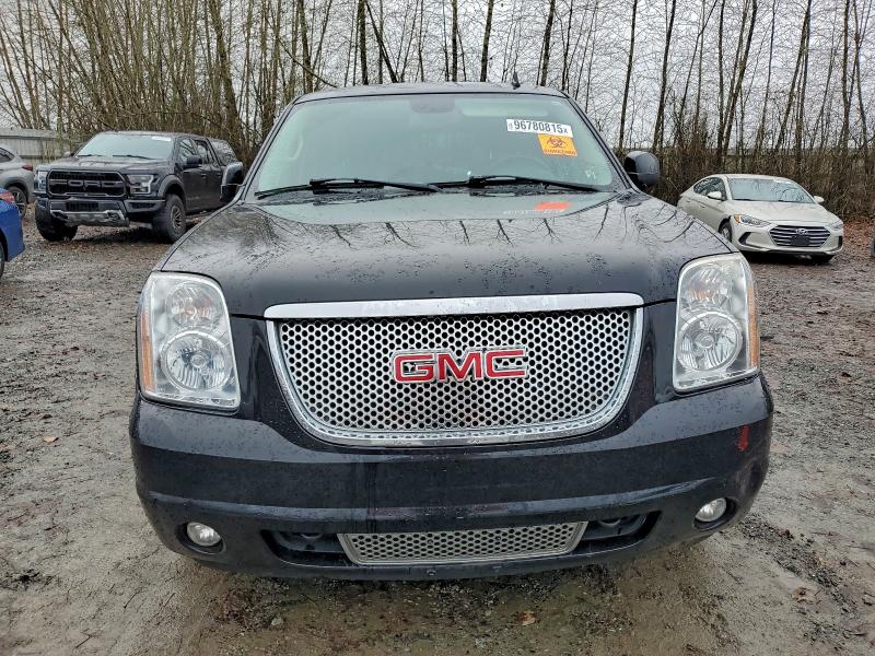 Photo 5 from auction – 2007 GMC YUKON DENA with VIN 1GKFK63807J381379