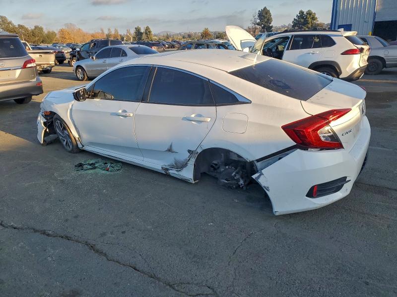Photo 2 from auction – 2017 HONDA CIVIC EX with VIN 2HGFC2F79HH564160