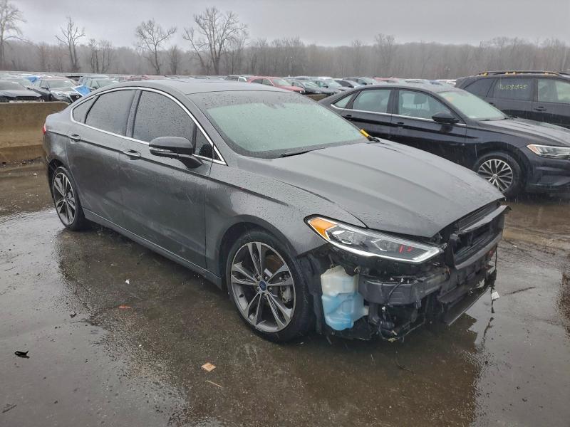 Photo 4 from auction – 2019 FORD FUSION TIT with VIN 3FA6P0D90KR184413