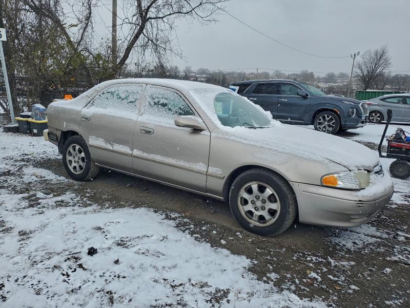 Photo 4 from auction – 2002 MAZDA 626 LX with VIN 1YVGF22C925285975