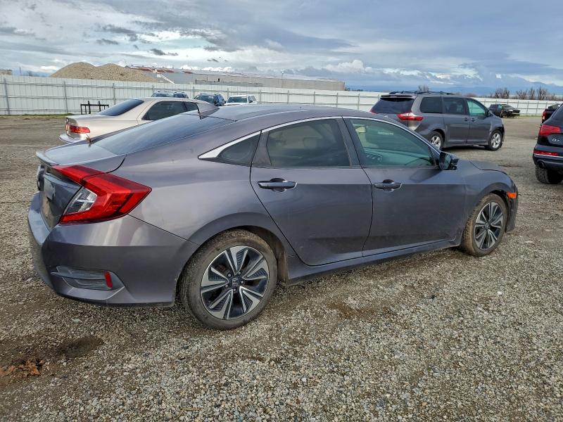 Photo 3 from auction – 2018 HONDA CIVIC EX with VIN JHMFC1F37JX010282