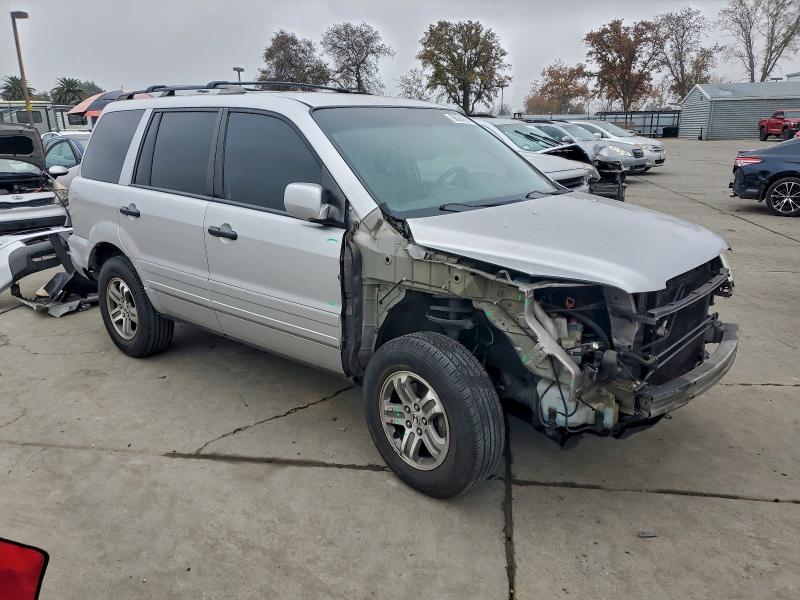Photo 4 from auction – 2004 HONDA PILOT EXL with VIN 2HKYF18564H533745