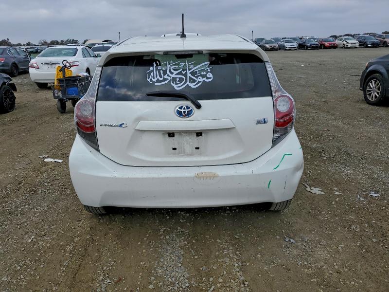 Photo 6 from auction – 2014 TOYOTA PRIUS C with VIN JTDKDTB32E1569102