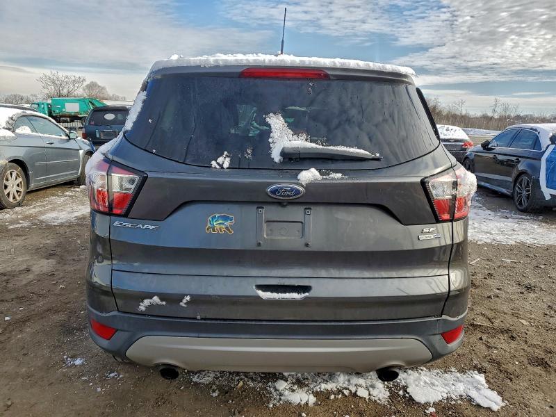 Photo 6 from auction – 2018 FORD ESCAPE with VIN 1FMCU9GD4JUC27860