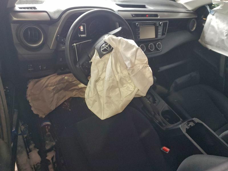 Photo 8 from auction – 2018 TOYOTA RAV4 LE with VIN 2T3BFREV6JW726524