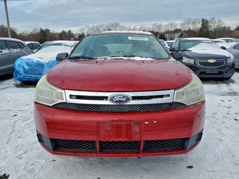 Photo 5 from auction – 2011 FORD FOCUS with VIN 1FAHP3EN1BW100182