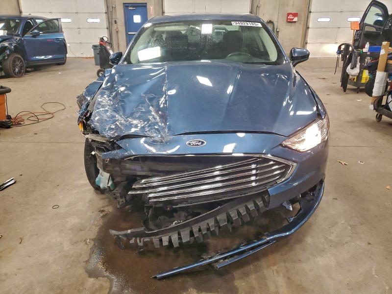 Photo 5 from auction – 2018 FORD FUSION SE with VIN 3FA6P0HD1JR204097