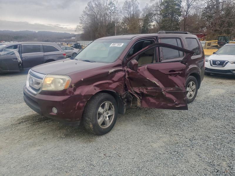 HONDA PILOT EXL 2011 with VIN 5FNYF3H63BB009324 - Photo from auction