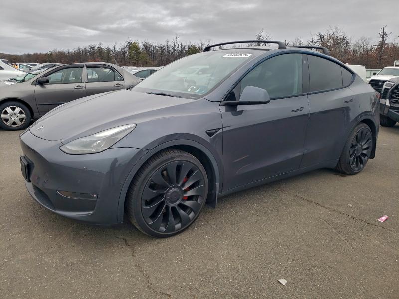 TESLA MODEL Y 2022 with VIN 7SAYGDEF8NF543160 - Photo from auction