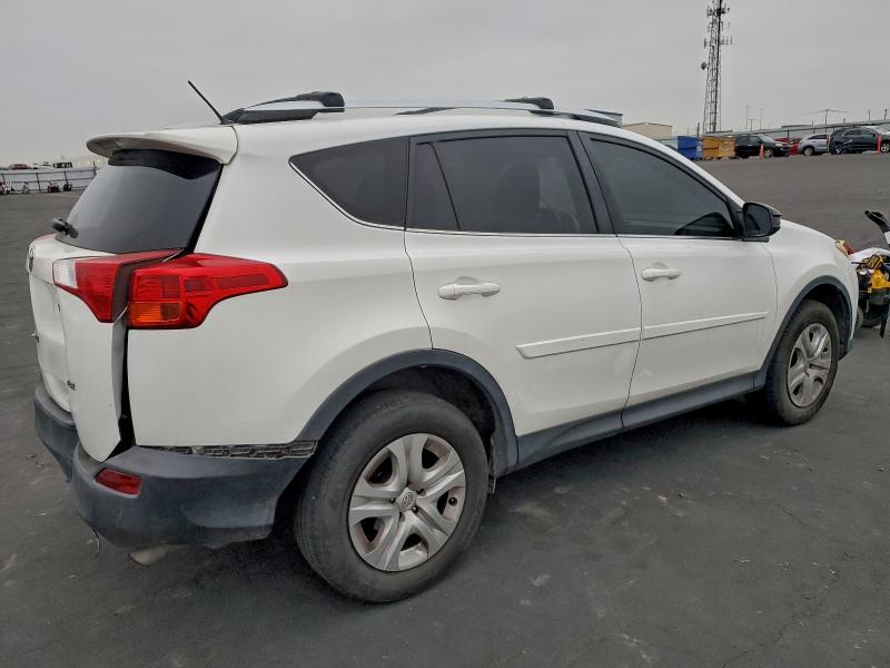 Photo 3 from auction – 2014 TOYOTA RAV4 LE with VIN JTMZFREV6EJ010824