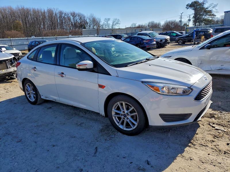 Photo 4 from auction – 2015 FORD FOCUS SE with VIN 1FADP3F24FL343415
