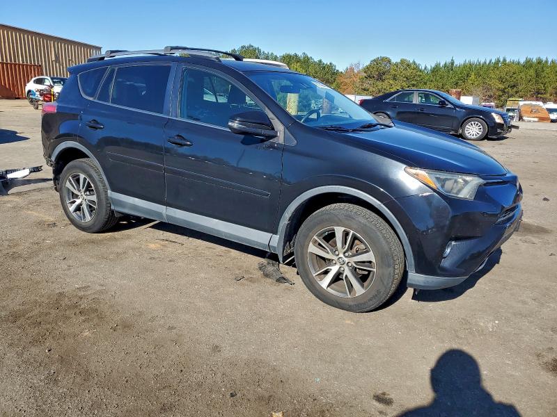 Photo 4 from auction – 2017 TOYOTA RAV4 XLE with VIN 2T3RFREV9HW580693