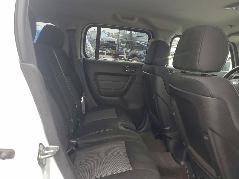 Photo 11 from auction – 2006 HUMMER H3 with VIN 5GTDN136168149495