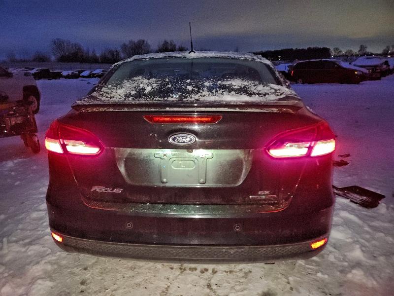 Photo 6 from auction – 2015 FORD FOCUS SE with VIN 1FADP3F24FL201081
