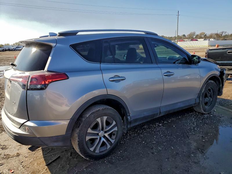 Photo 3 from auction – 2018 TOYOTA RAV4 LE with VIN 2T3ZFREV3JW438877