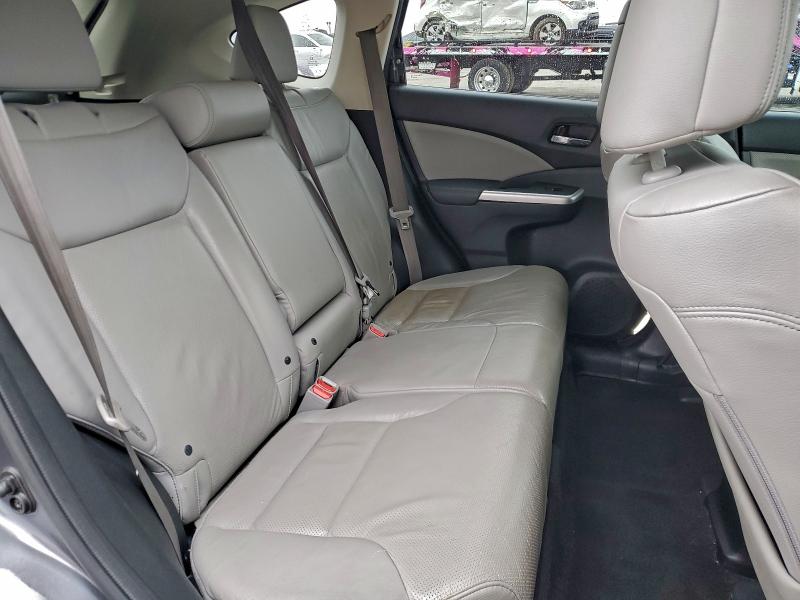 Photo 11 from auction – 2016 HONDA CR-V EXL with VIN 2HKRM3H70GH500512
