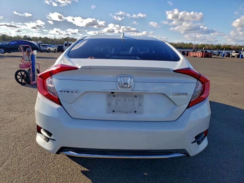 Photo 6 from auction – 2019 HONDA CIVIC TOUR with VIN 19XFC1F99KE200561