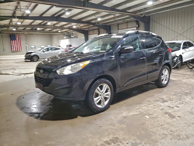 HYUNDAI TUCSON GLS 2012 with VIN KM8JUCAC9CU350660 - Photo from auction