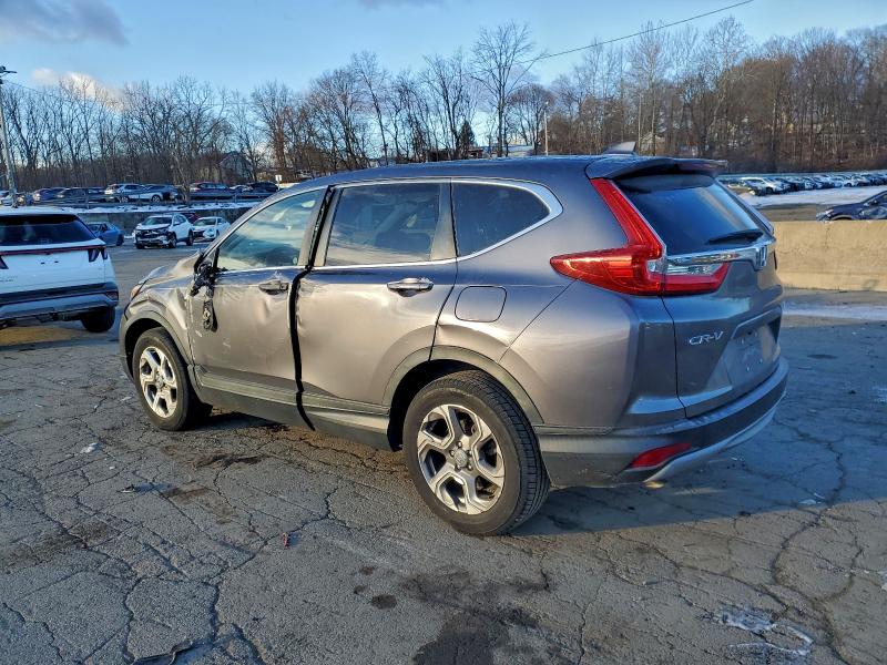 Photo 2 from auction – 2018 HONDA CR-V EX with VIN 7FARW2H54JE022334