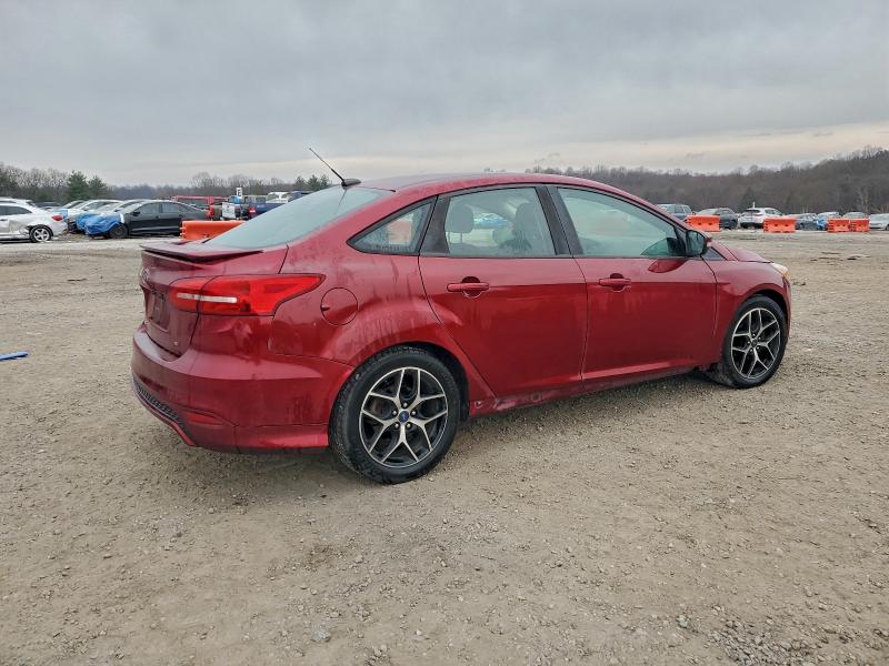 Photo 3 from auction – 2016 FORD FOCUS SE with VIN 1FADP3F21GL385154