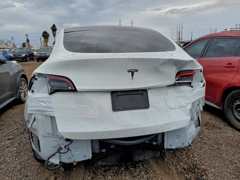 Photo 6 from auction – 2021 TESLA MODEL Y with VIN 5YJYGAEE0MF212204