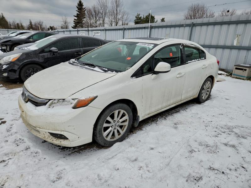 HONDA CIVIC LX 2012 with VIN 2HGFB2E51CH017976 - Photo from auction