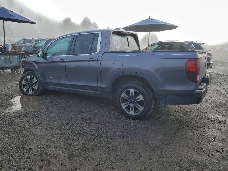 Photo 2 from auction – 2019 HONDA RIDGELINE with VIN 5FPYK3F6XKB013859