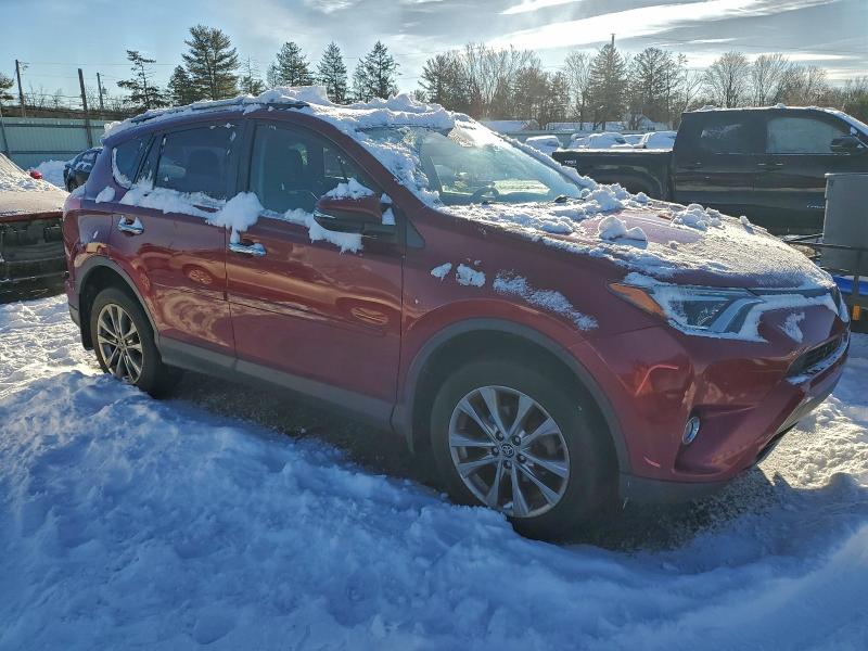 Photo 4 from auction – 2018 TOYOTA RAV4 LIMIT with VIN JTMDFREV1JD237616
