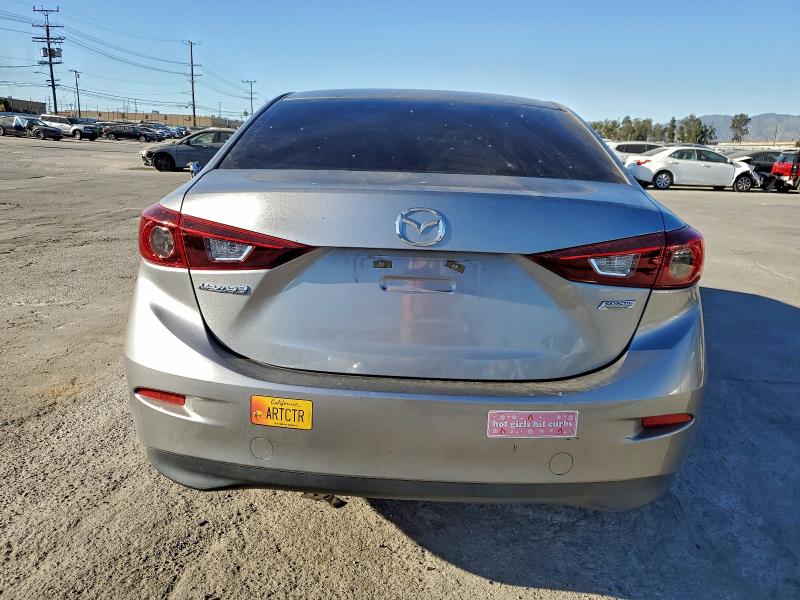 Photo 6 from auction – 2014 MAZDA 3 SV with VIN JM1BM1T76E1149378