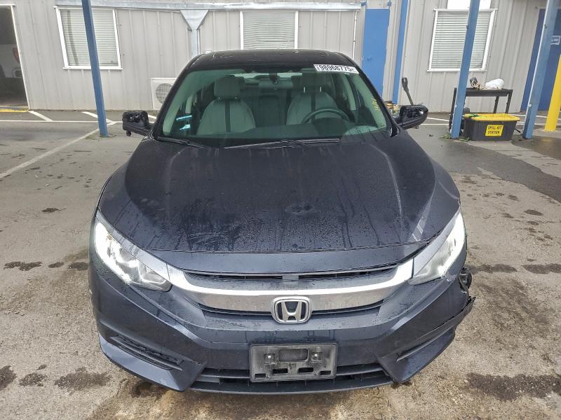 Photo 5 from auction – 2017 HONDA CIVIC EX with VIN 2HGFC2F79HH538142