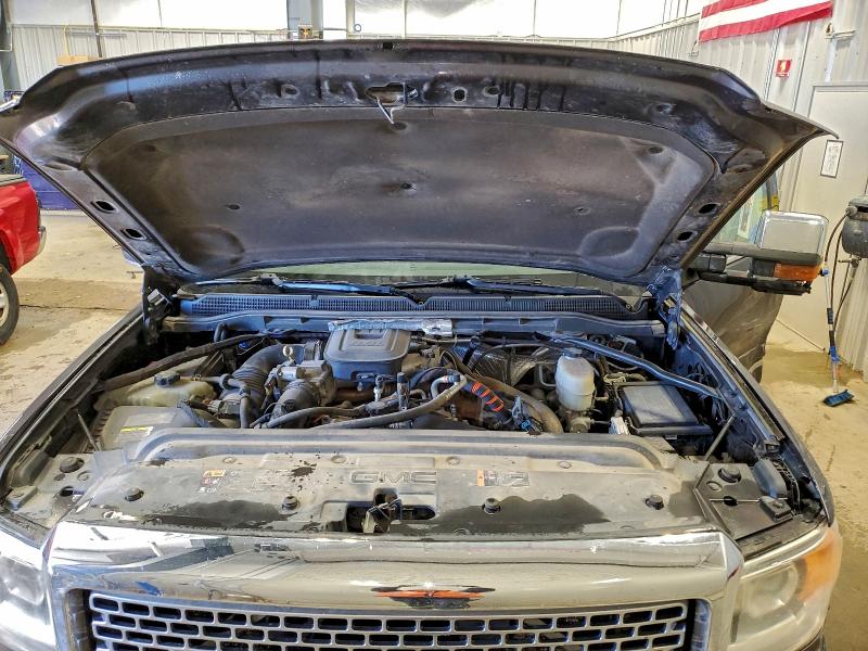 Photo 11 from auction – 2015 GMC SIERRA K25 with VIN 1GT120E8XFF548459