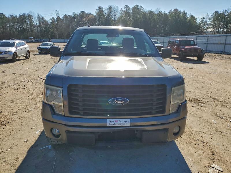 Photo 5 from auction – 2014 FORD F150 with VIN 1FTMF1CM7EFB49465