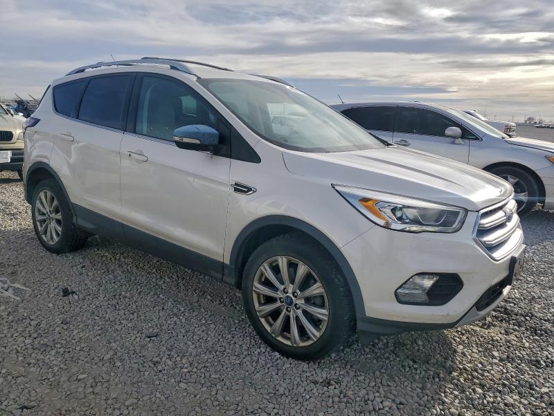 Photo 4 from auction – 2017 FORD ESCAPE TIT with VIN 1FMCU9JD0HUE61741