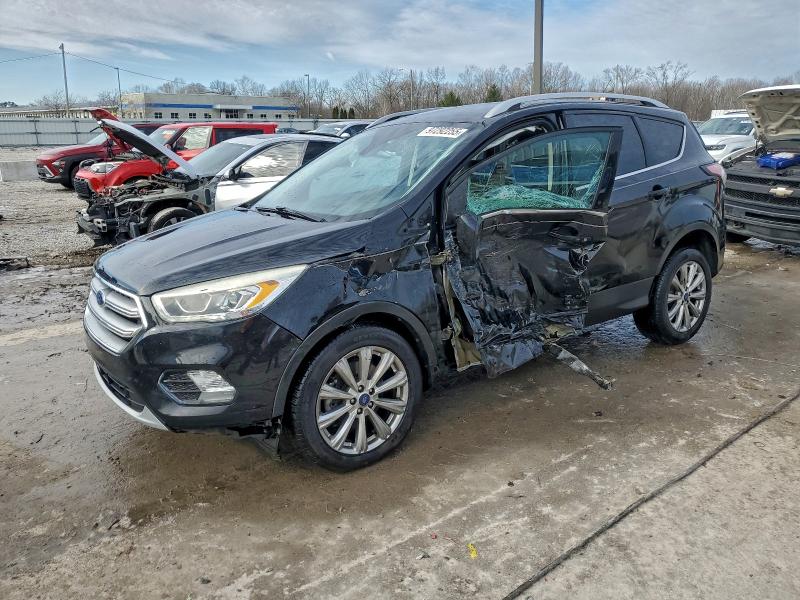 FORD ESCAPE 2017 with VIN 1FMCU9JD6HUE15055 - Photo from auction