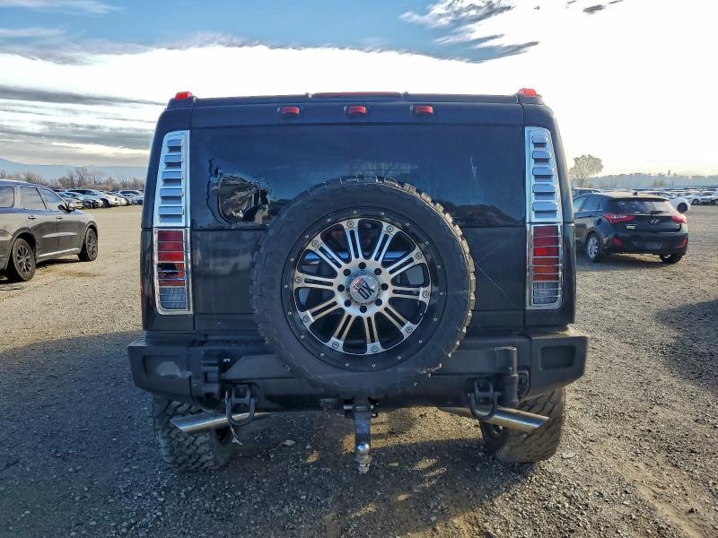 Фото 6 с аукциона – 2004 HUMMER H2 с VIN 5GRGN23U04H119666