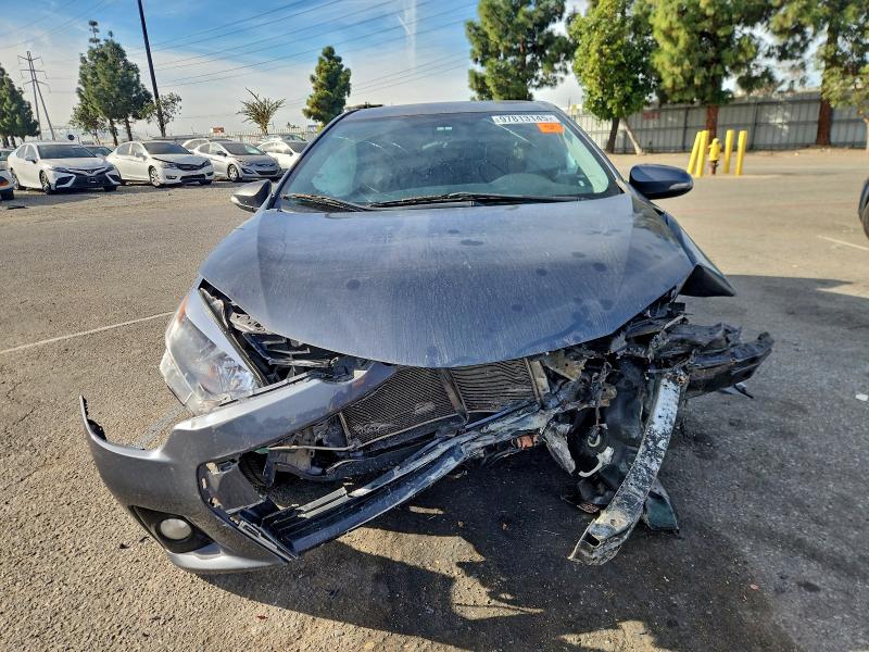 Photo 5 from auction – 2015 TOYOTA COROLLA L with VIN 5YFBURHE8FP325334