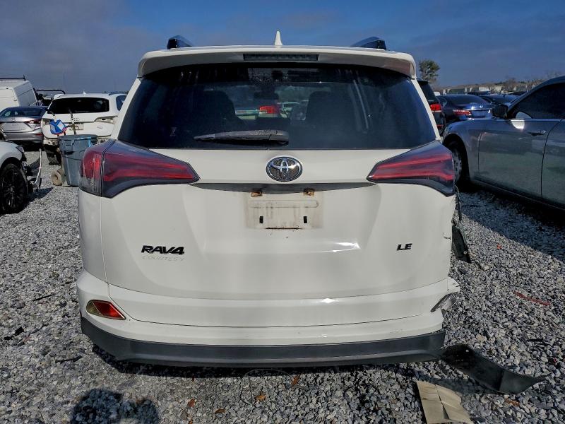 Photo 6 from auction – 2018 TOYOTA RAV4 LE with VIN JTMZFREV8JJ177972