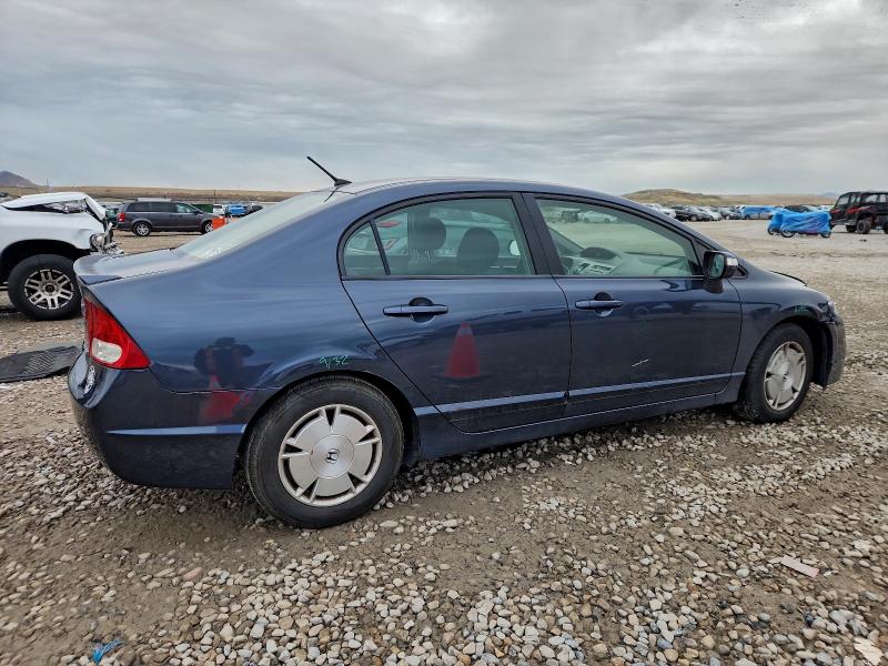 Photo 3 from auction – 2010 HONDA CIVIC HYBR with VIN JHMFA3F28AS002634