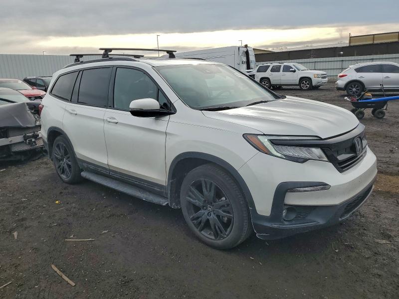 Photo 4 from auction – 2022 HONDA PILOT BLAC with VIN 5FNYF6H7XNB030993