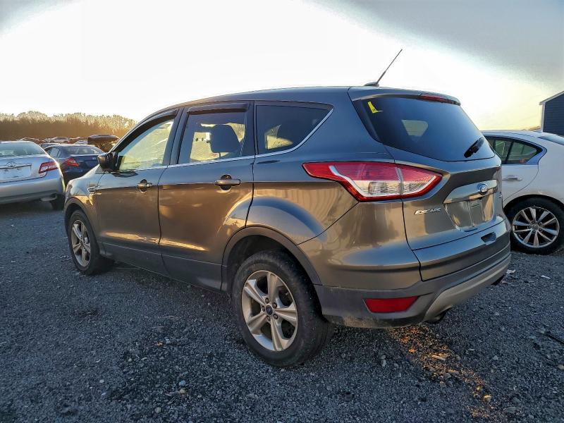 Photo 2 from auction – 2014 FORD ESCAPE with VIN 1FMCU9GX9EUC96897