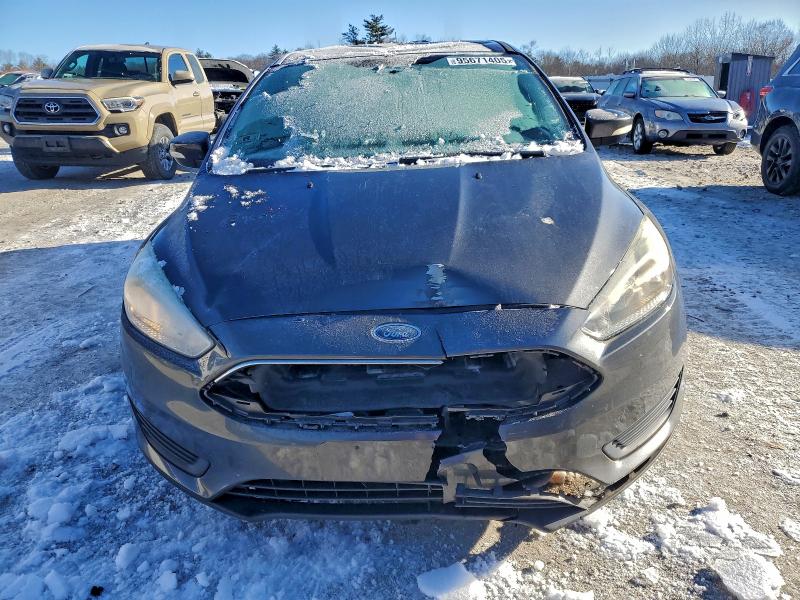 Foto 5 de la subasta – 2015 FORD FOCUS SE con VIN 1FADP3F21FL277504