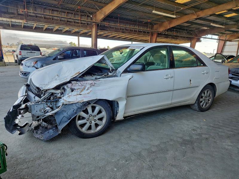 Photo 1 from auction – 2003 TOYOTA CAMRY LE with VIN JTDBE32K230144714