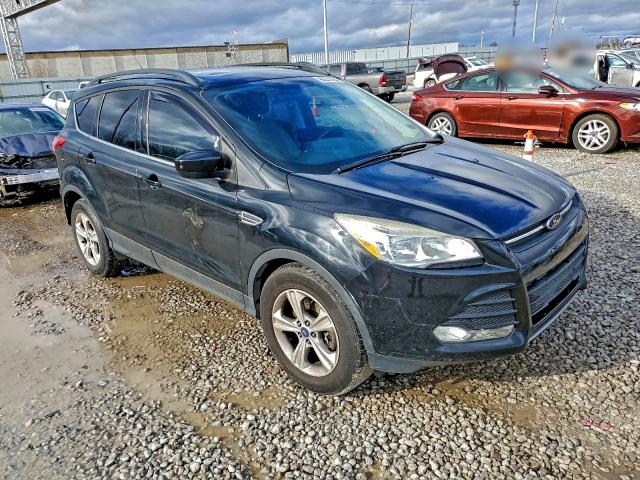 Photo 4 from auction – 2016 FORD ESCAPE SE with VIN 1FMCU9GXXGUA93410