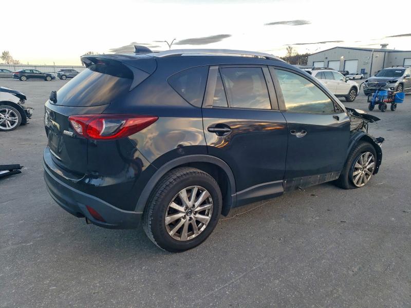 Photo 3 from auction – 2013 MAZDA CX-5 TOURI with VIN JM3KE2CE0D0156047