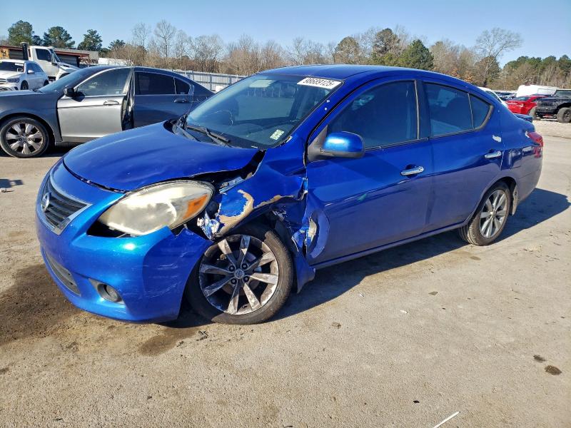 NISSAN VERSA S 2014 with VIN 3N1CN7AP5EL877440 - Photo from auction