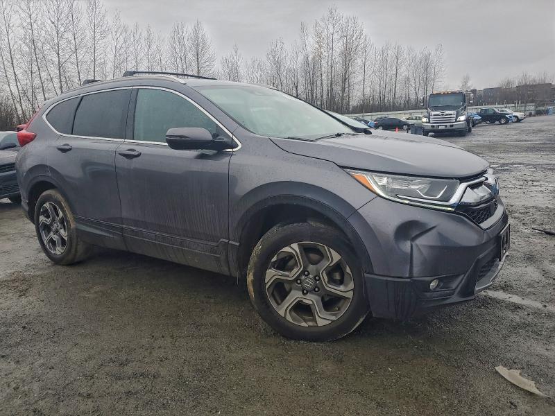 Photo 4 from auction – 2018 HONDA CR-V EX with VIN 2HKRW2H52JH627093