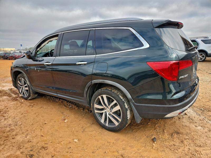 Photo 2 from auction – 2016 HONDA PILOT TOUR with VIN 5FNYF5H95GB009788