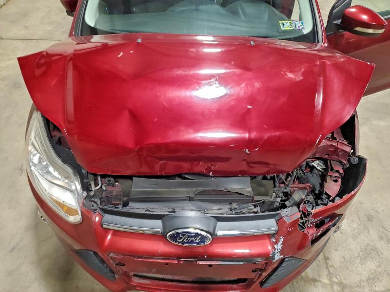 Photo 11 from auction – 2013 FORD FOCUS SE with VIN 1FADP3F26DL240641