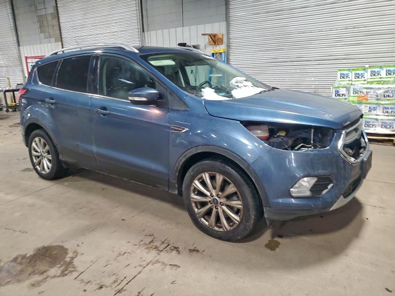 Photo 4 from auction – 2018 FORD ESCAPE TIT with VIN 1FMCU9J95JUC35552